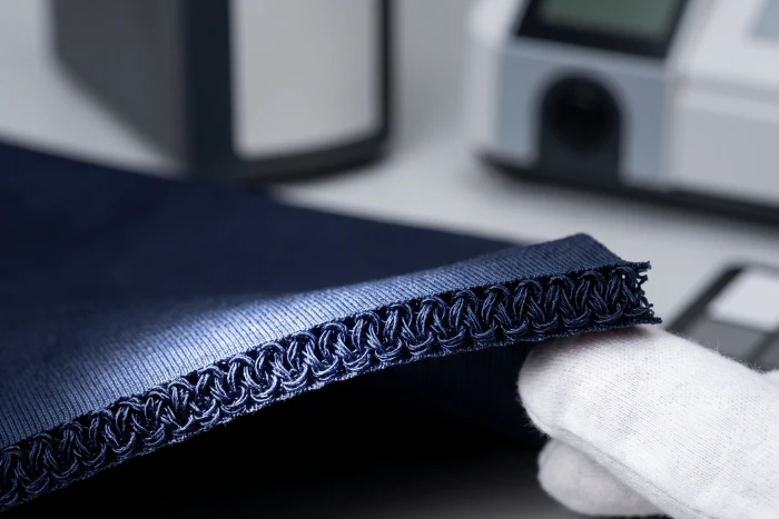 Nylon fabric cross-section, full penetration.